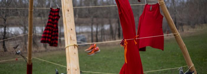 red dresses on a memorial site