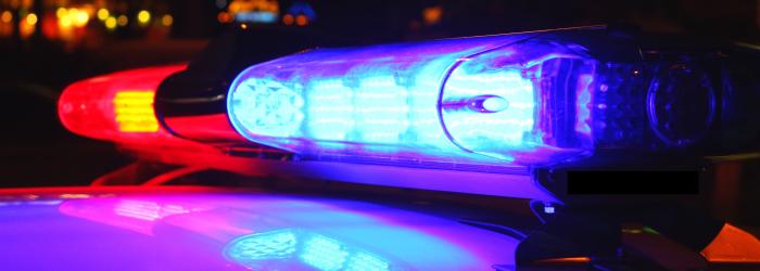 Lit up Police lights at night