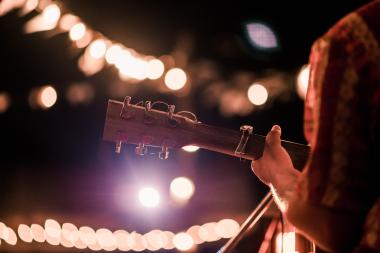 a person playing guitar